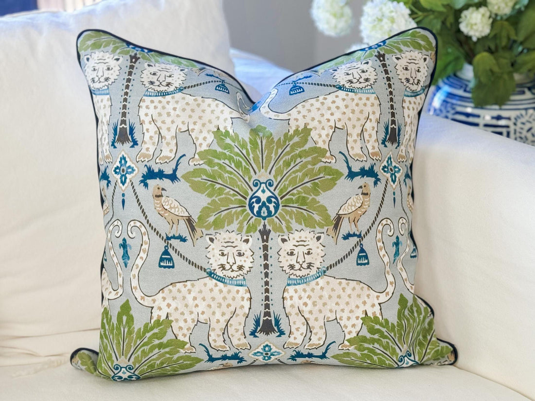 Happy Jaguar animal print throw pillow styled on a sofa